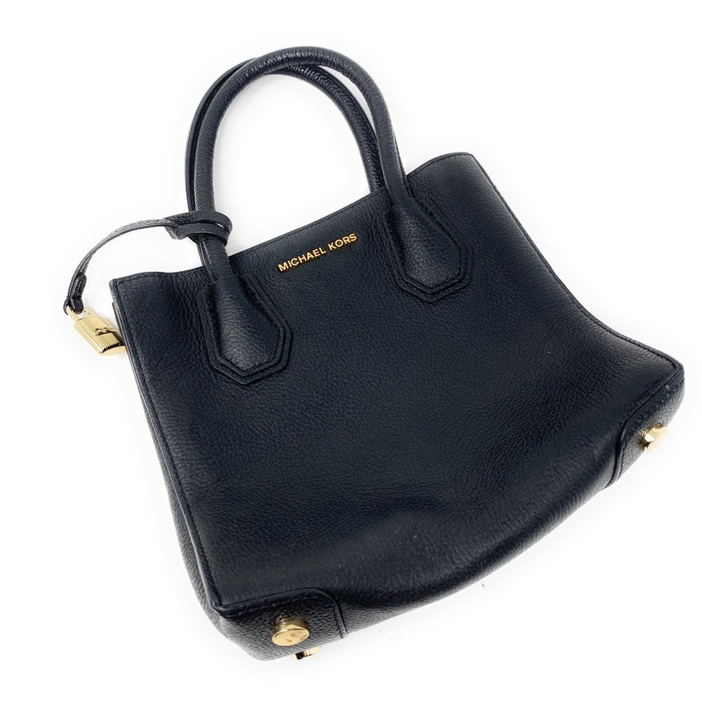 Small black Michael Kors purse. Used. Great condition.